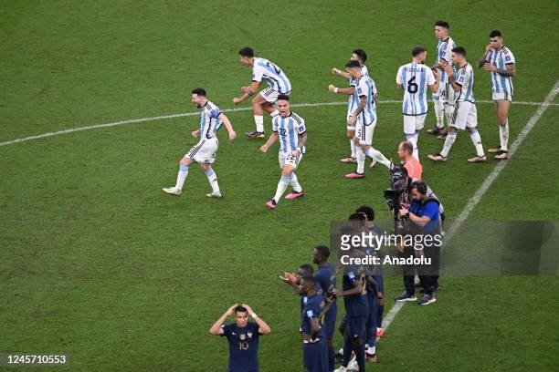 Players of Argentina celebrate their victory after the penalty shoot out stage of FIFA World Cup 2022 Final Match between Argentina and France at...