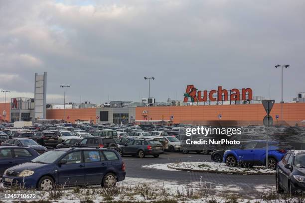 Thousands of cars in the Auchan shopping center parking just one week before Christmas lot are seen in Gdansk, Poland on 17 December 2022