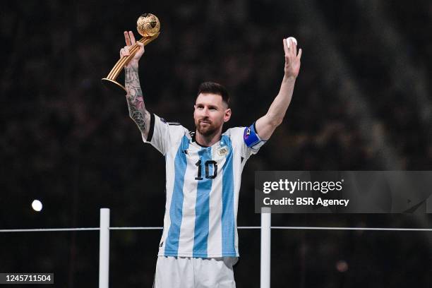 Lionel Messi of Argentina poses with the Golden Ball Award after the Final - FIFA World Cup Qatar 2022 match between Argentina and France at the...
