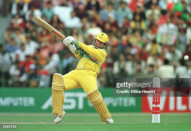 Cricket captain Mark Taylor of Australia smashes a shot to the boundary during the Cricket World Cup Final between Australia and Sri Lanka played at...