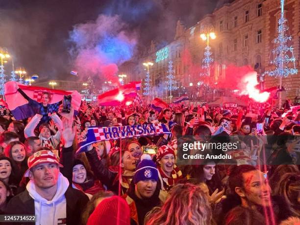 Croatian supporters celebrate during a welcoming ceremony upon the return of the Croatian national football team from the Qatar 2022 World Cup,...
