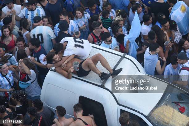 Fans of Argentina celebrate at the National Flag Memorial after their team´s victory in the final match of the FIFA World Cup Qatar 2022 against...