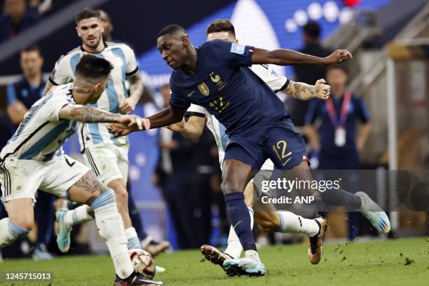 Enzo Fernandez of Argentina, Randal Kolo Muani of France during the FIFA World Cup Qatar 2022 final match between Argentina and France at Lusail...