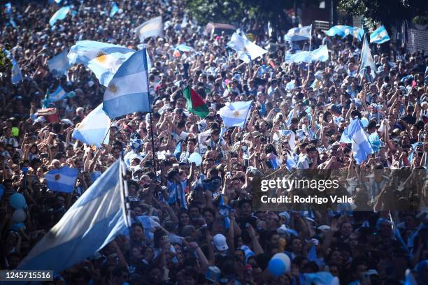 Fan of Argentina celebrate holding a Bangladesh flag after Argentina's victory against France in the final match of FIFA World Cup Qatar 2022 between...