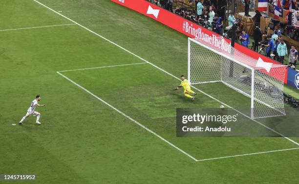 Lionel Messi of Argentina scores the team's first goal via a penalty during the FIFA World Cup 2022 Final Match between Argentina and France at...