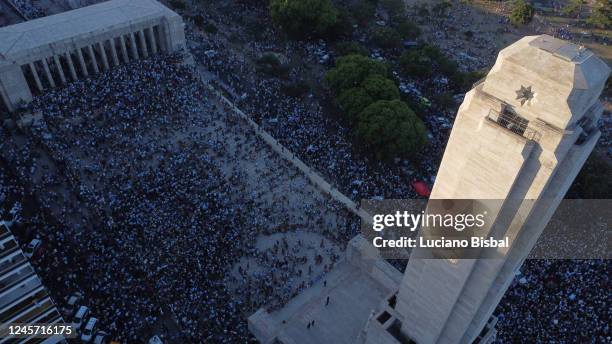 Aerial view as Argentine fans gather to celebrate at Flag Monument in Rosario after their teams victory in the final match of the FIFA World Cup...