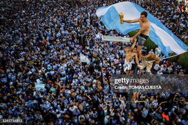 In this aerial view fans of Argentina celebrate winning the Qatar 2022 World Cup against France at the Obelisk in Buenos Aires, on December 18, 2022.
