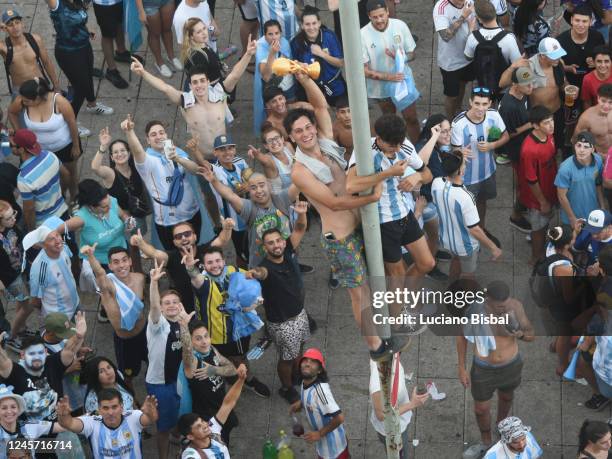 Aerial view as Argentine fans gather to celebrate at Flag Monument in Rosario after their teams victory in the final match of the FIFA World Cup...