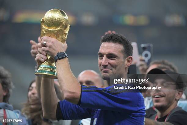 Lionel Scaloni, head coach of Argentina lifts the World Cup during the FIFA World Cup Qatar 2022 Final match between Argentina and France at Lusail...