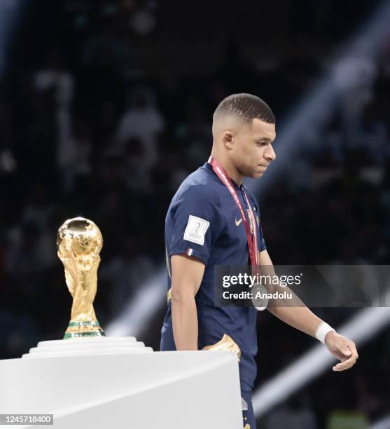 Kylian Mbappe of France is seen with the Golden Boot award during a ceremony after the FIFA World Cup 2022 Final Match between Argentina and France...