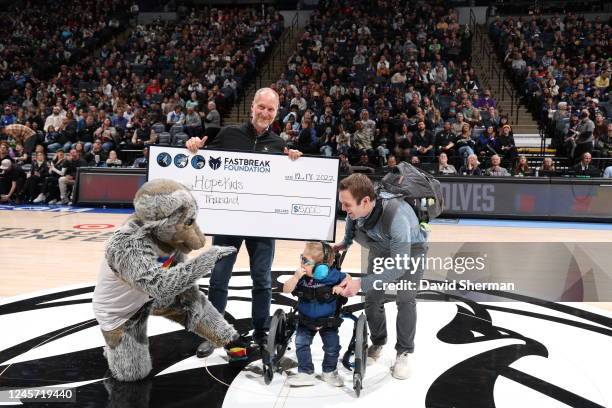 Minnesota Timberwolves Fastbreak Foundation presents a fifteen-thousand dollar check to the Minnesota Chapter of HopeKids on December 18, 2022 at...