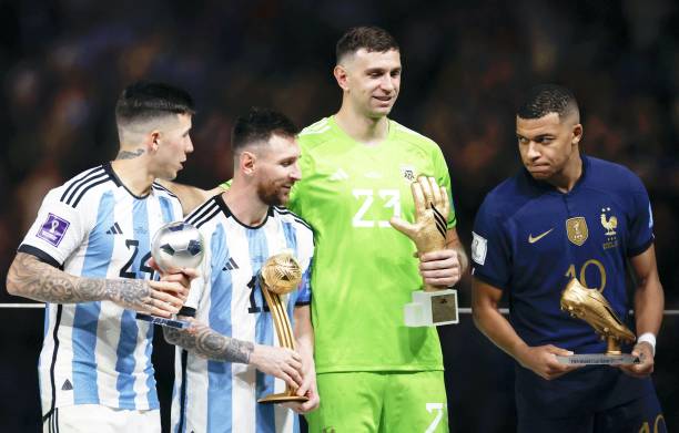 Argentina's Enzo Fernandez, Lionel Messi, Emiliano Martinez and France's Kylian Mbappe, who won World Cup individual prizes -- the Best Young Player,...