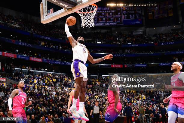 LeBron James of the Los Angeles Lakers drives to the basket during the game against the Washington Wizards on December 18, 2022 at Crypto.Com Arena...