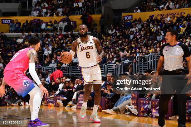 LeBron James of the Los Angeles Lakers moves the ball during the game against the Washington Wizards on December 18, 2022 at Crypto.Com Arena in Los...