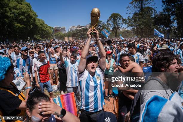 Fans from Argentina celebrate Argentina's victory as world champion as they support their team against the France national football team during live...