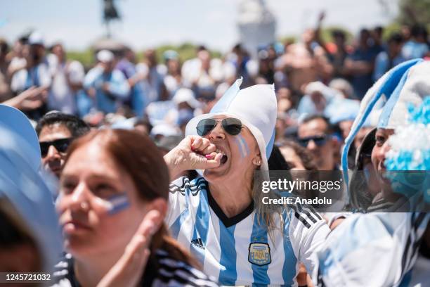 Fans from Argentina support their team against the France national football team during live the Qatar 2022 FIFA World Cup final match on a giant...