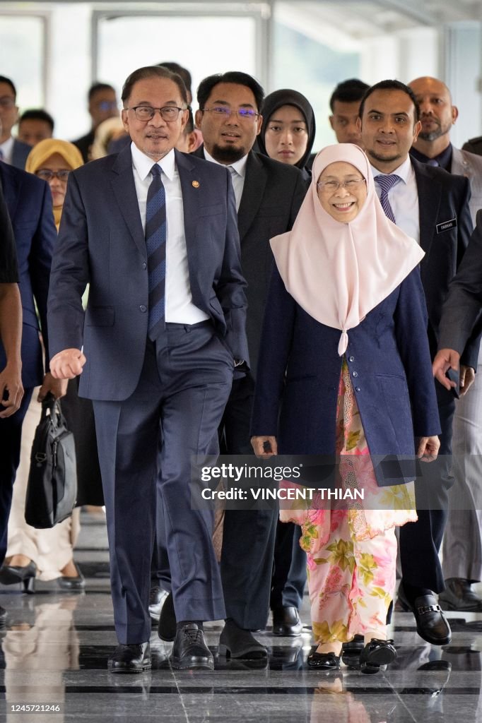 Malaysia's Prime Minister Anwar Ibrahim and his wife Wan Azizah... News ...