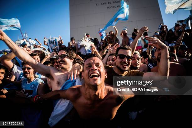 Group of fans celebrates at the foot of the obelisk in Buenos Aires. After the victory against France, thousands of Argentines took to the streets to...