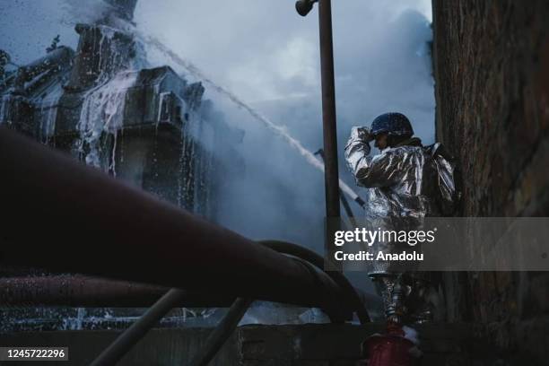 Firefighters conduct extinguishing works after Russia's unmanned aerial vehicle attacks in Kyiv, Ukraine on December 19, 2022. Ukrainian Armed Forces...