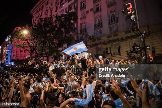 Fans of the Argentine national team in the city of Buenos Aires supporting their team the day of the Qatar 2022 FIFA World Cup final against the...