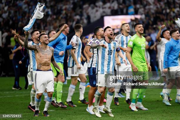 Lionel Messi of Argentina and team celebrate after winning the FIFA World Cup Qatar 2022 Final match between Argentina and France at Lusail Stadium...