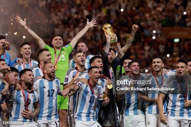 Lionel Messi of Argentina and team celebrate after winning the FIFA World Cup Qatar 2022 Final match between Argentina and France at Lusail Stadium...