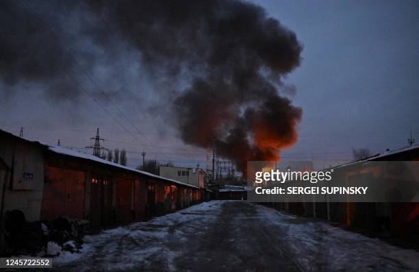 This photograph shows an object of a critical power infrastructure as it burns after a drone attack to Kyiv, amid the Russian invasion of Ukraine. -...