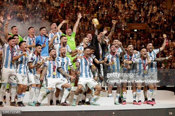 Lionel Messi of Argentina and team celebrate after winning the FIFA World Cup Qatar 2022 Final match between Argentina and France at Lusail Stadium...