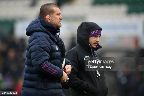 Northamptonshire , United Kingdom - 18 December 2022; Munster head coach Graham Rowntree, left, and head of athletic performance Ged McNamara before...