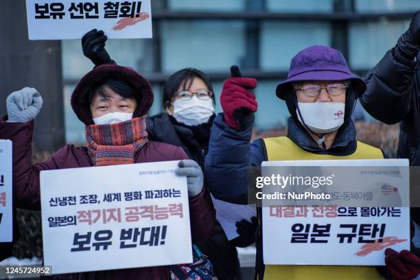 Members of Peace and Unification hold a press conference in front of the Japanese Embassy in Seoul to urge the withdrawal of the declaration that the...