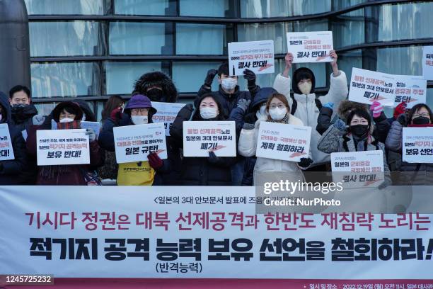 Members of Peace and Unification hold a press conference in front of the Japanese Embassy in Seoul to urge the withdrawal of the declaration that the...