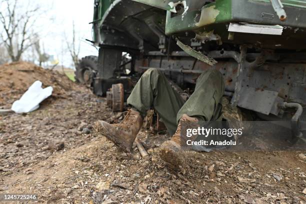 December 18: Ukrainian army mechanic extracts parts from a damaged Russian military vehicle at the entrance to Kherson town, in Kherson, Ukraine, on...