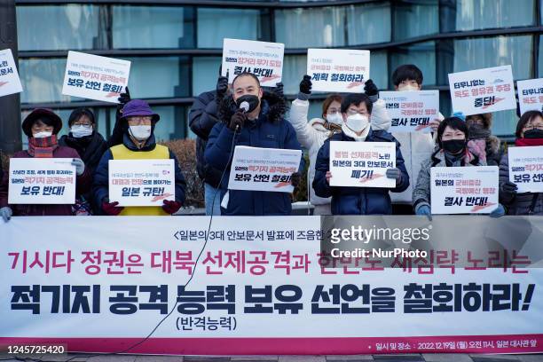 Members of Peace and Unification hold a press conference in front of the Japanese Embassy in Seoul to urge the withdrawal of the declaration that the...