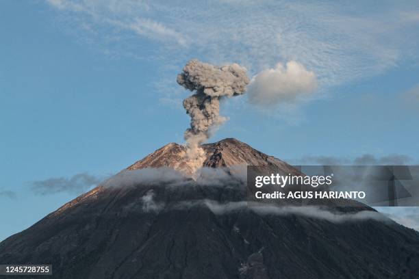 This picture taken on December 17 shows mount Semeru spewing thick smoke and hot lava in Lumajang, East Java.