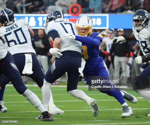 Inglewood, CA Los Angeles Chargers linebacker Kyle Van Noy, right, sacks Tennessee Titans quarterback Ryan Tannehill during the second half at SoFi...