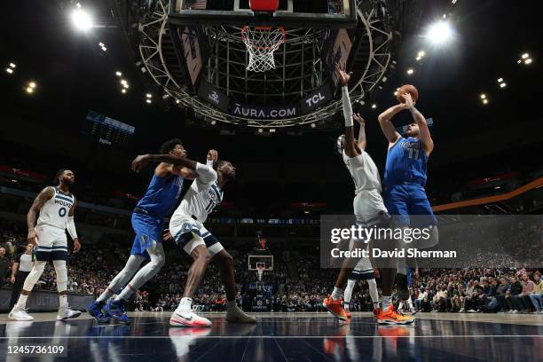 Luka Doncic of the Dallas Mavericks shoots the ball during the game against the Minnesota Timberwolves on December 19, 2022 at Target Center in...