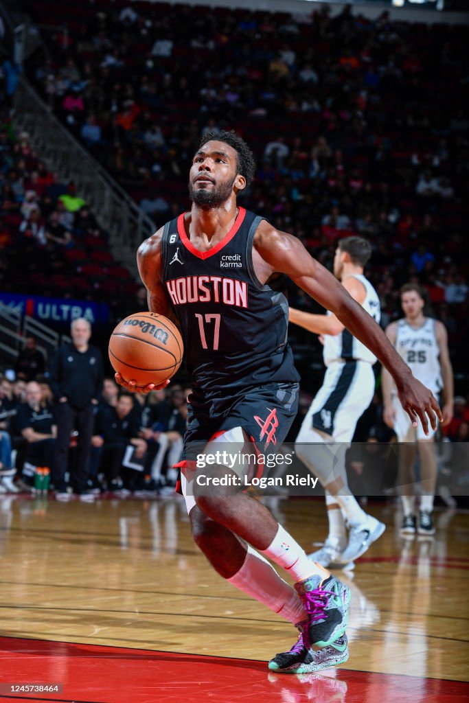 Tari Eason of the Houston Rockets drives to the basket during the ...