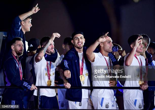 Lionel Messi and teammates Rodrigo De Paul, Leandro Paredes, Lautaro Martinez and Julian Alvarez celebrates during the arrival of the Argentina men's...