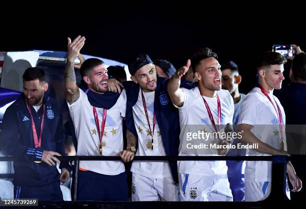 Lionel Messi and teammates Rodrigo De Paul, Leandro Paredes, Lautaro Martinez and Julian Alvarez celebrates during the arrival of the Argentina men's...