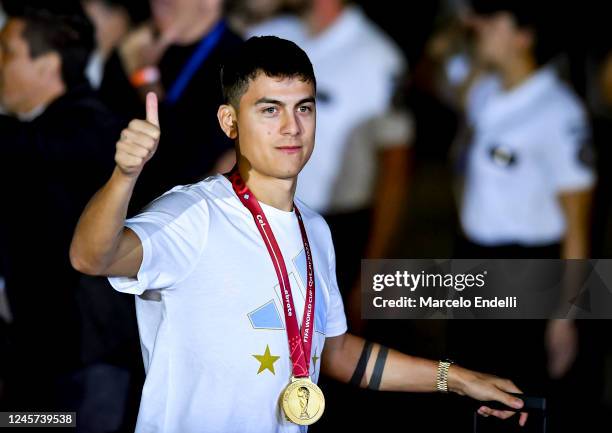 Paulo Dybala greets the fans during the arrival of the Argentina men's national football team after winning the FIFA World Cup Qatar 2022 on December...