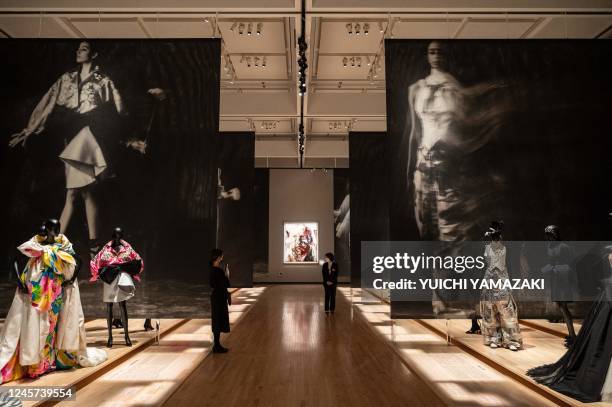 This picture taken on December 19, 2022 shows the exhibition "Christian Dior: Designer of Dreams" during a media preview at the Museum of...