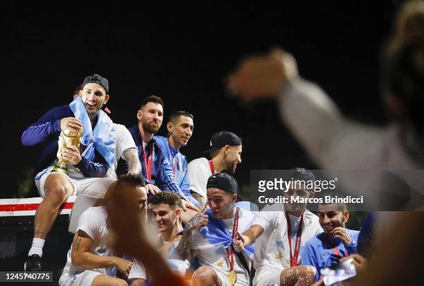 Enzo Fernandez, Lionel Messi, Angel Dimaria and Rodrigo De Paul of Argentina men's national football team and teammates are welcomed by fans as they...