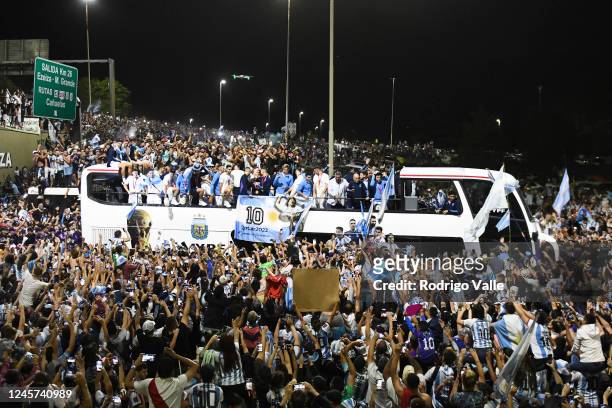 Players of Argentina celebrate with the fans during the arrival of the Argentina men's national football team after winning the FIFA World Cup Qatar...