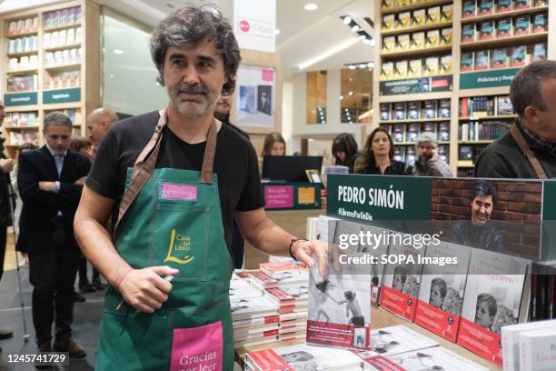 Pedro Simón during the campaign "Acción de Navidad Por la lectura" at the Casa del Libro bookstore in Madrid. "Acción de Navidad Por la lectura" is a...