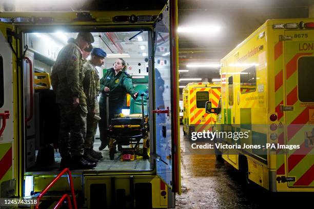 Military personnel from the Household Division are trained in an ambulance at Wellington Barracks in London, as they prepare to provide cover for...