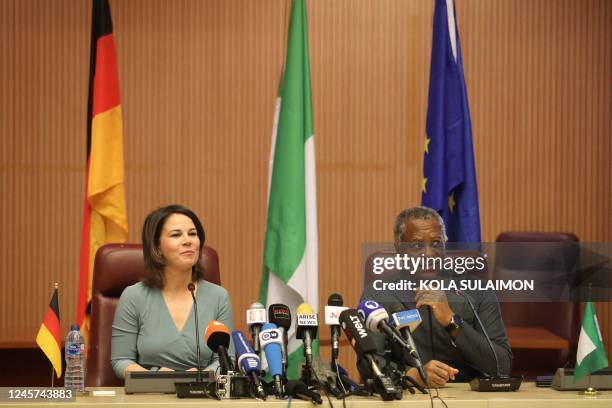 Germany Federal Foreign Minister Annalena Baerbock sit next to Nigeria Minister of Foreign Affairs, Geoffrey Onyeama , as they speak in Abuja on...