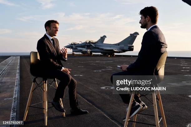 French president Emmanuel Macron gives an interview to Bastien Augey for French TV channel TF1 aboard the Charles de Gaulle french navy aircraft...