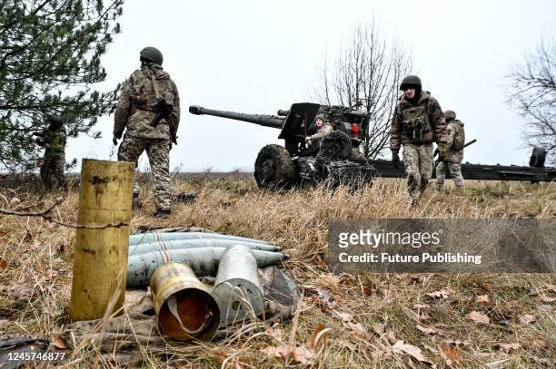 The artillerymen who destroyed columns of Russian equipment near Kyiv are pictured next to the trailed howitzer "Msta-B" as they stand on the defense...