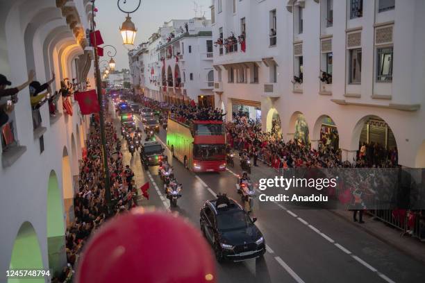 Supporters cheer during the homecoming parade of of Morocco's national football team in central Rabat, Morocco December 20, 2022. Morocco national...