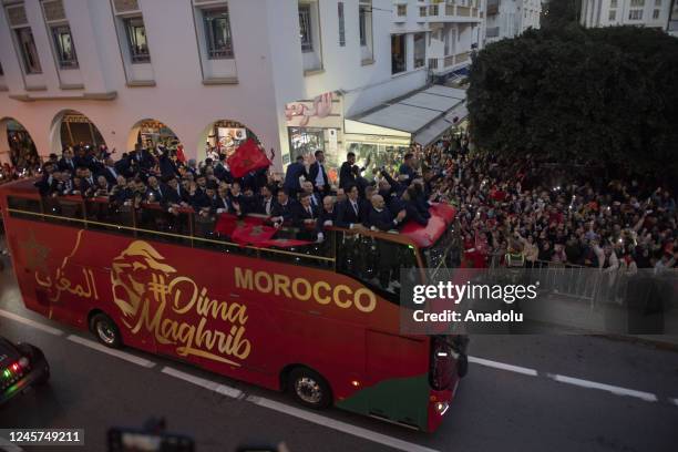 Supporters cheer during the homecoming parade of of Morocco's national football team in central Rabat, Morocco December 20, 2022. Morocco national...